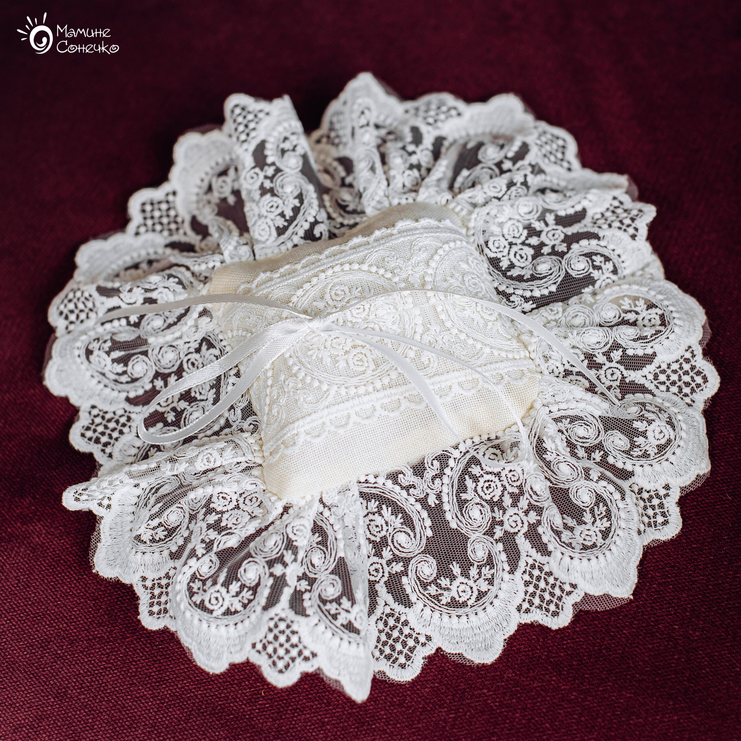 Cross stitch cushion “Royal Monarchy”, white linen